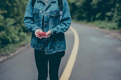 human person standing on a road person