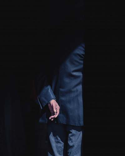 person person wearing black formal suit human