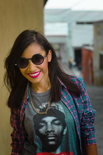 woman selective focus photo of woman wearing sunglasses girl