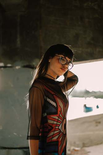 human selective focus photography of woman wearing eyeglasses woman
