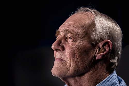 person side view of man's face face