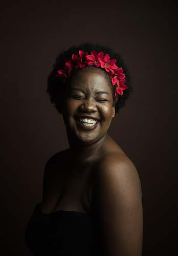 human smiling woman wearing black top person