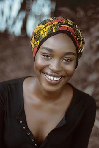 person smiling woman wearing turban human