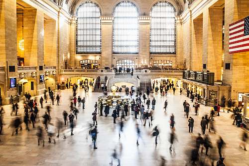 person time lapse photography of group of people inside building building