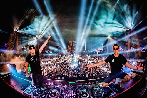 person two DJ's on concert human