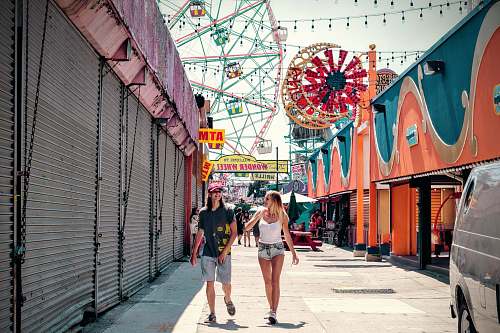 person two women walking on amusement park human