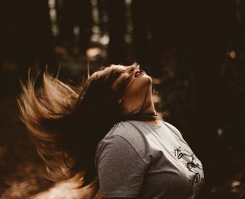 person woman flipping her hair human