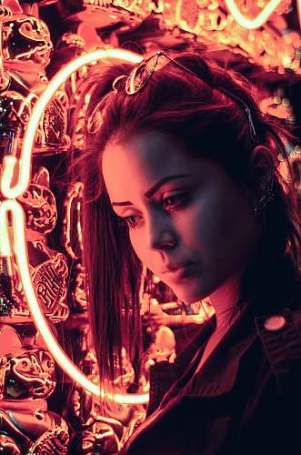 person woman in black top near neon sign human
