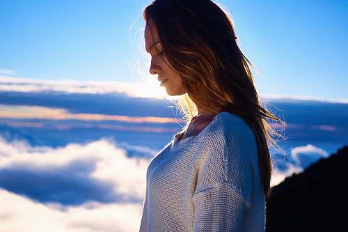 woman woman looking down during daytime girl