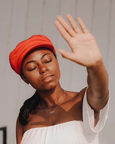 person woman raising right hand human