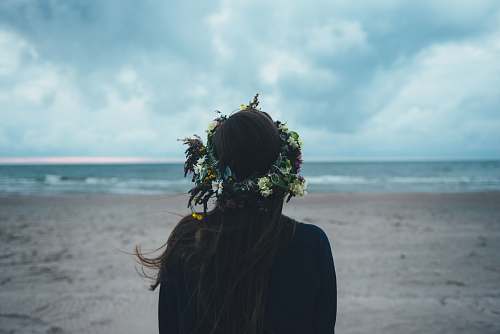 woman woman standing near seashore during daytime sea