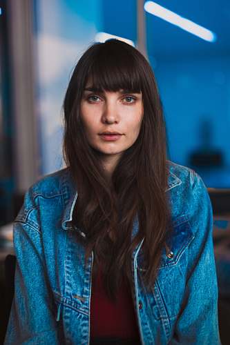 human woman wearing blue denim jacket person