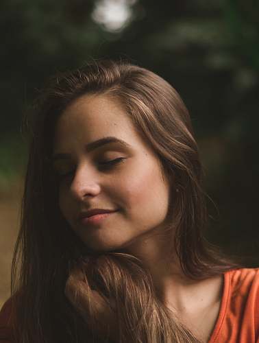 person woman wearing orange shirt human