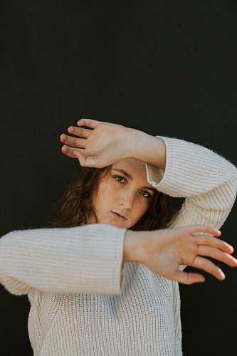human woman wearing white corduroy long-sleeved shirt person