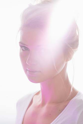 person woman wearing white scoop-neck shirt portrait