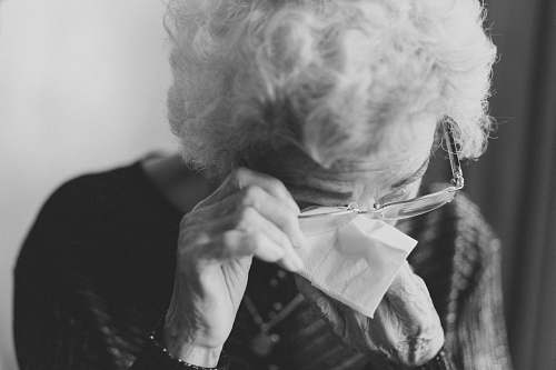 human woman wiping her eyes black-and-white