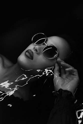 human woman's hippie style sunglasses black-and-white