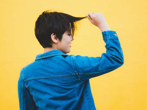human women wearing blue denim jacket person