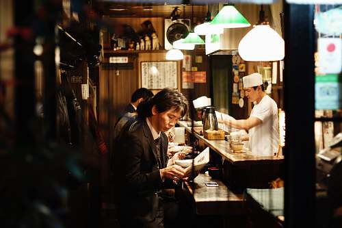 japan man holding menu restaurant