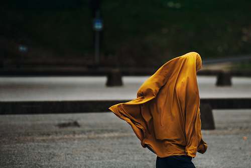people person wearing yellow jacket human