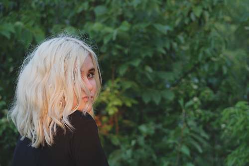 woman woman in black top looking back girl