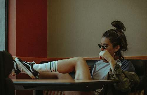 people woman sitting on couch human