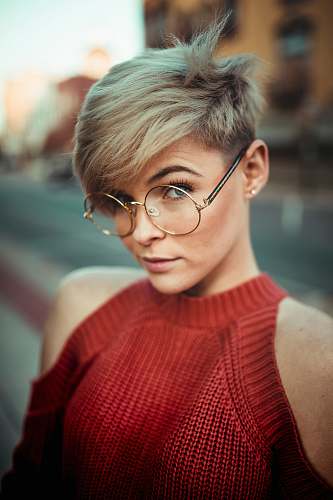 people woman wearing round eyeglasses human