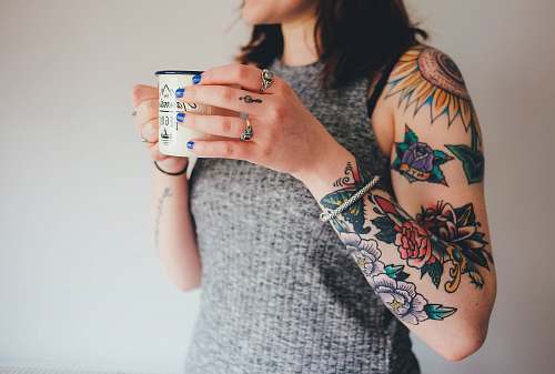 people woman holding white ceramic mug ring