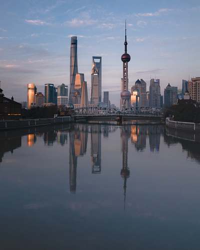 city aerial photo of body of water during daytime metropolis