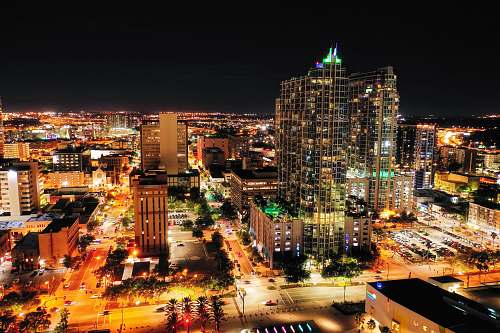 city aerial photograph of city at night downtown