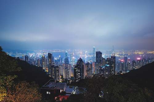 city aerial photography of cities during night time hong kong