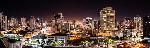 city aerial photography of city buildings at night urban