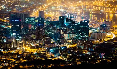 city aerial photography of city skyline during nighttime town