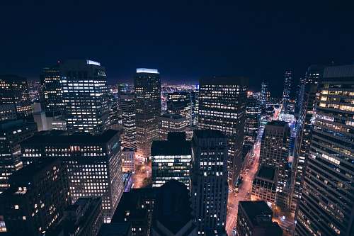 city aerial shot of city skyline at night downtown