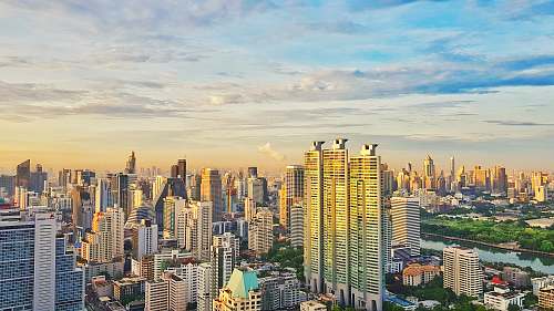 city aerial view of city building during daytime high rise