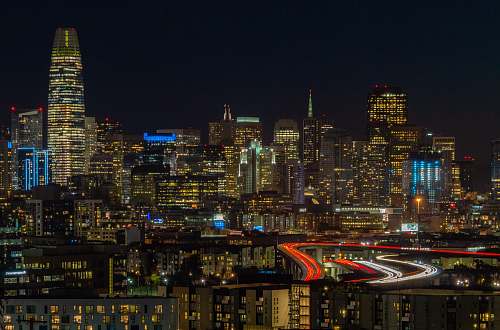 city aerial view of city buildings during nighttime metropolis