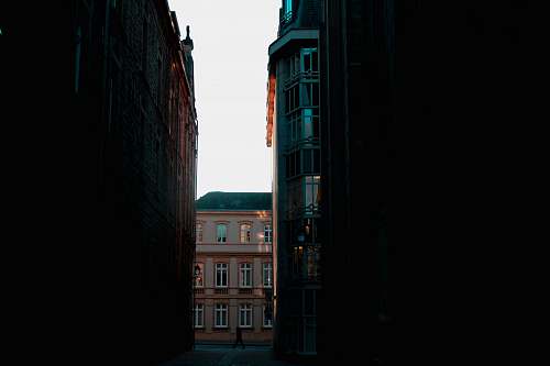 street alley in between two houses at the city town