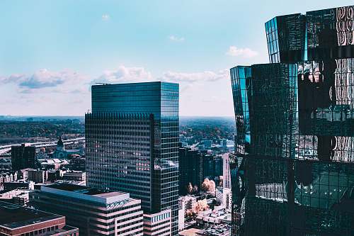 city architectural photography of green and black building urban