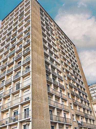 city beige and white painted building high rise