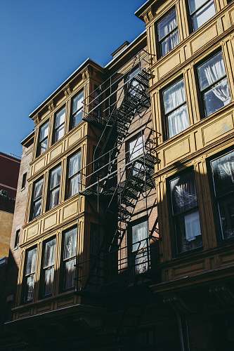 city black metal fire exit ladder high rise