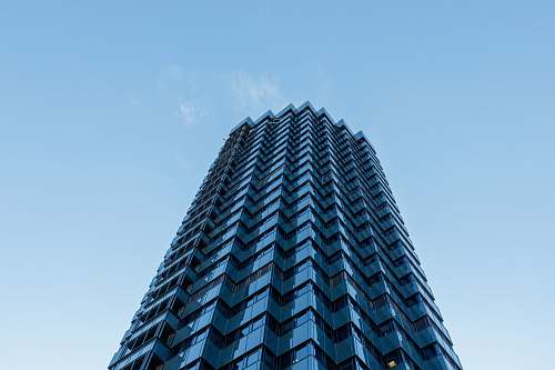 city blue building worms-eye view high rise