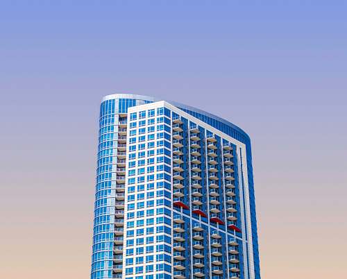 condo blue high-rise building during daytime housing