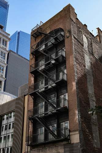 city brown and gray high-rise building high rise