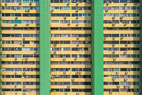 town brown and green concrete building during daytime urban