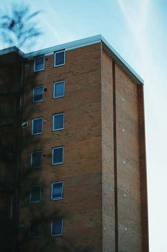 city brown brick building high rise