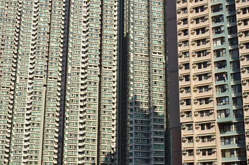 city brown buildings during daytime high rise