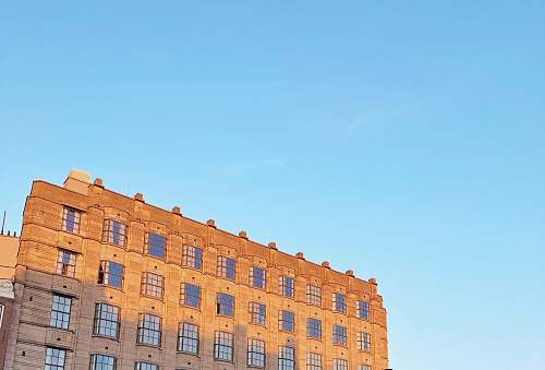 city brown concrete building high rise