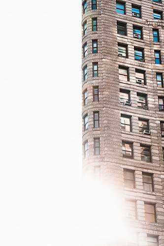 city brown concrete building during daytime photo urban