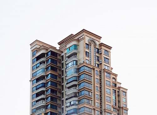condo brown high rise building housing