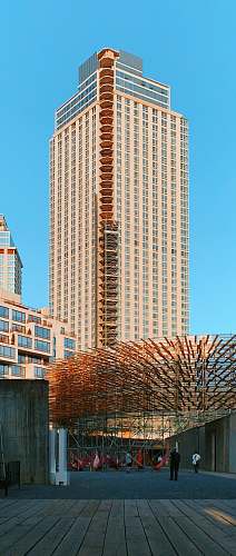 city brown high rise building during daytime high rise